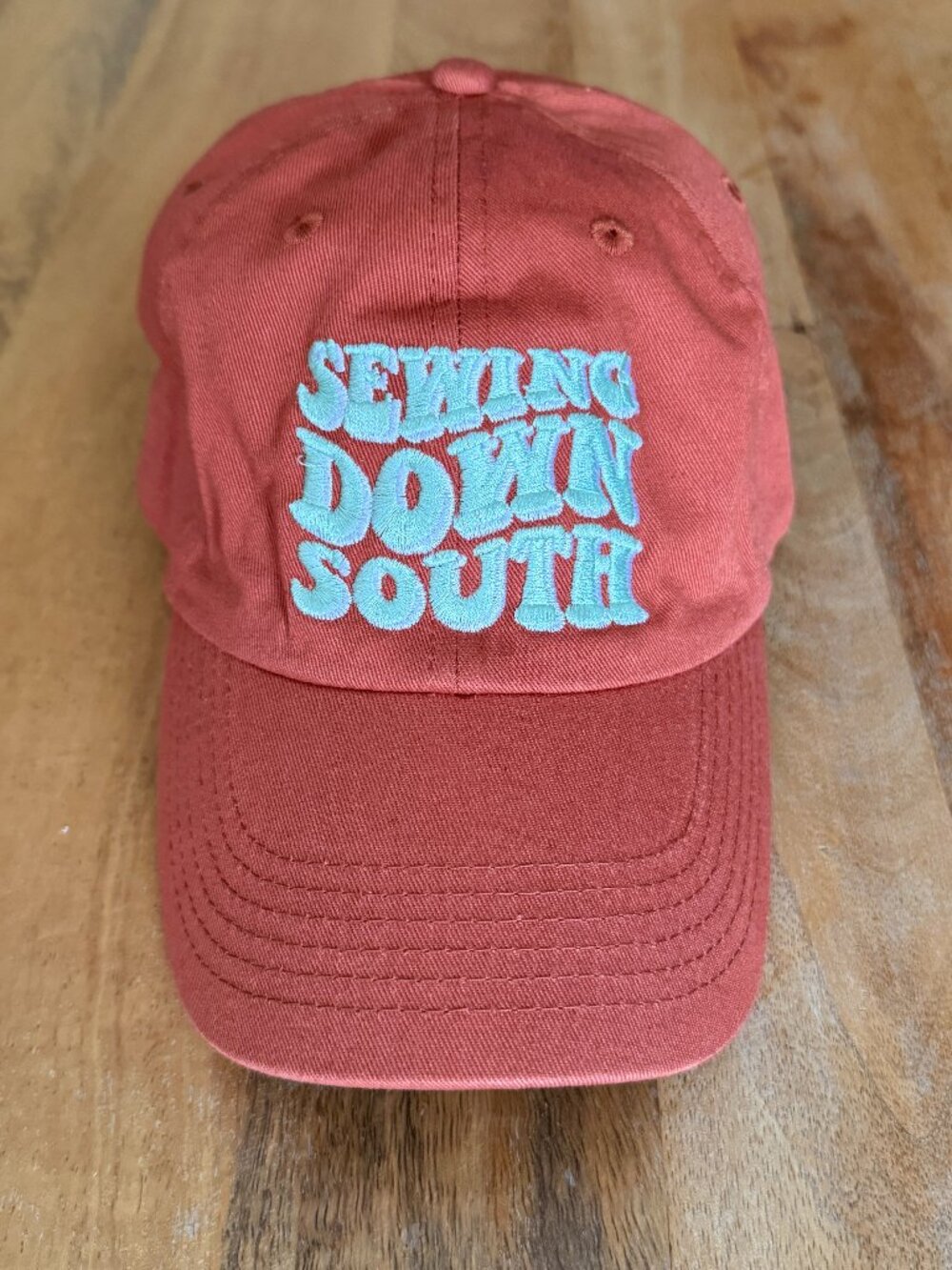 Sewing Down South Orange Green Hat